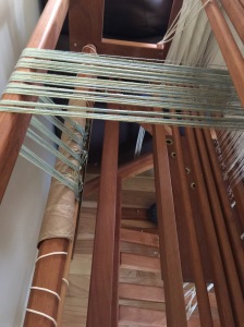 back side of the loom with ends showing